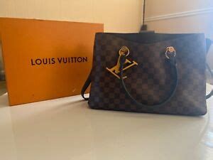 cuanto sale una cartera louis vuitton original en dolares